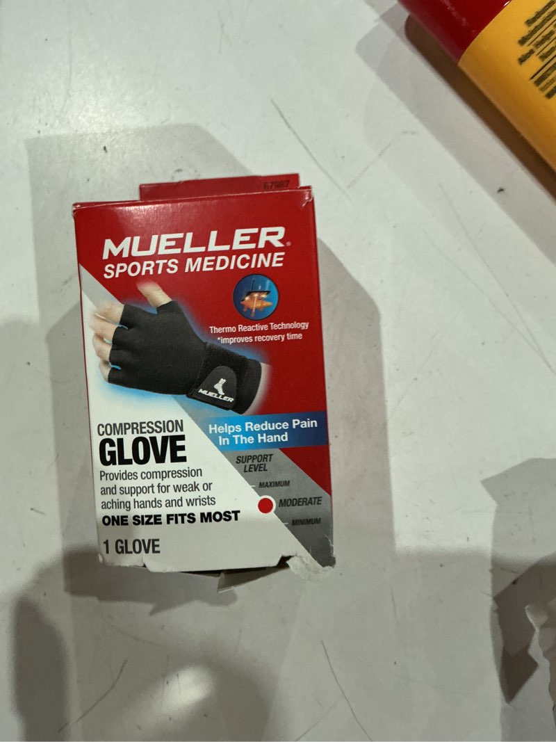 Condition photo showing New/Like New for mueller reversible compression glove, black, unisex, one size fits most