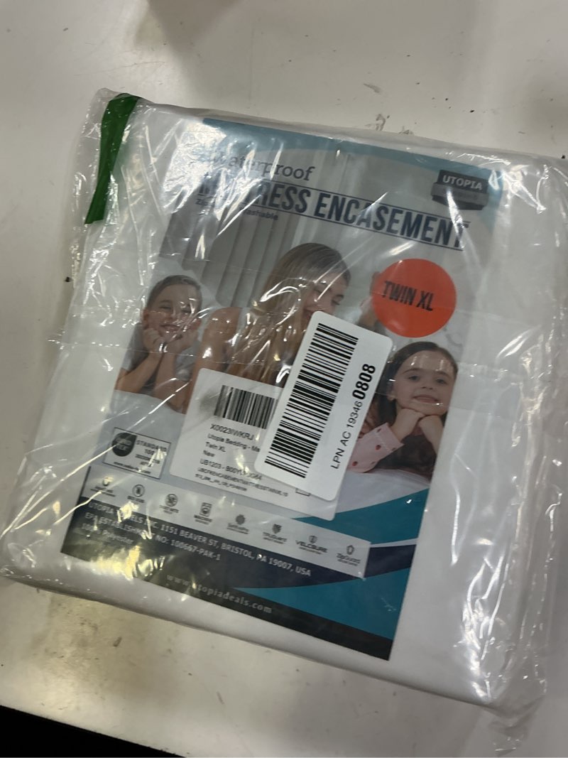 Condition photo showing New/Like New for utopia bedding mattress protector zippered twin xl size, 100% waterproof bed bug and dust mite proof mattress encasement, absorbent 6 sided mattress cover 1 twin xl
