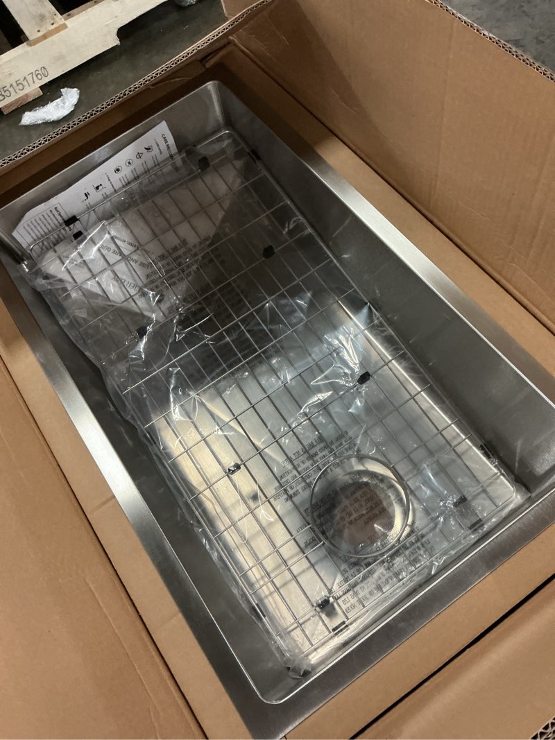 Condition photo showing New/Like New for tight radius 31 in. undermount single bowl 18 gauge stainless steel kitchen sink with accessories