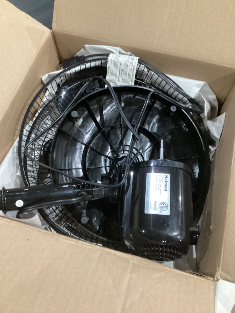 Condition photo showing Good Condition for holmes 12 inch oscillating table fan 3 speeds 75 degree wide angle oscillation adjustable 15 degree tilt quiet operation home office bedroom kitchen black