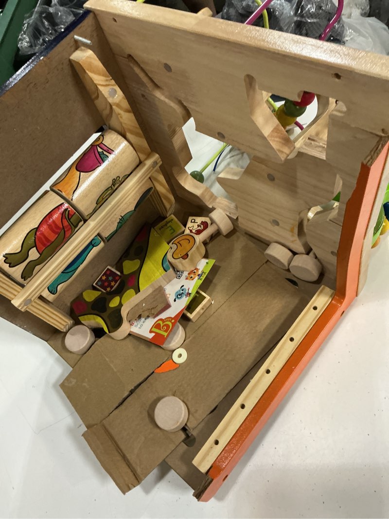 Condition photo showing As Is for b. toys wooden activity cube - zany zoo