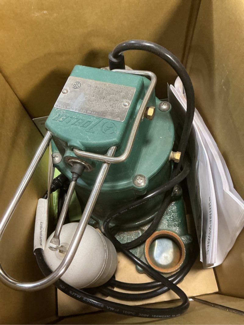 Condition photo showing As Is for zoeller 1/3 hp 2880 gph cast iron vertical float switch ac submersible sump pump