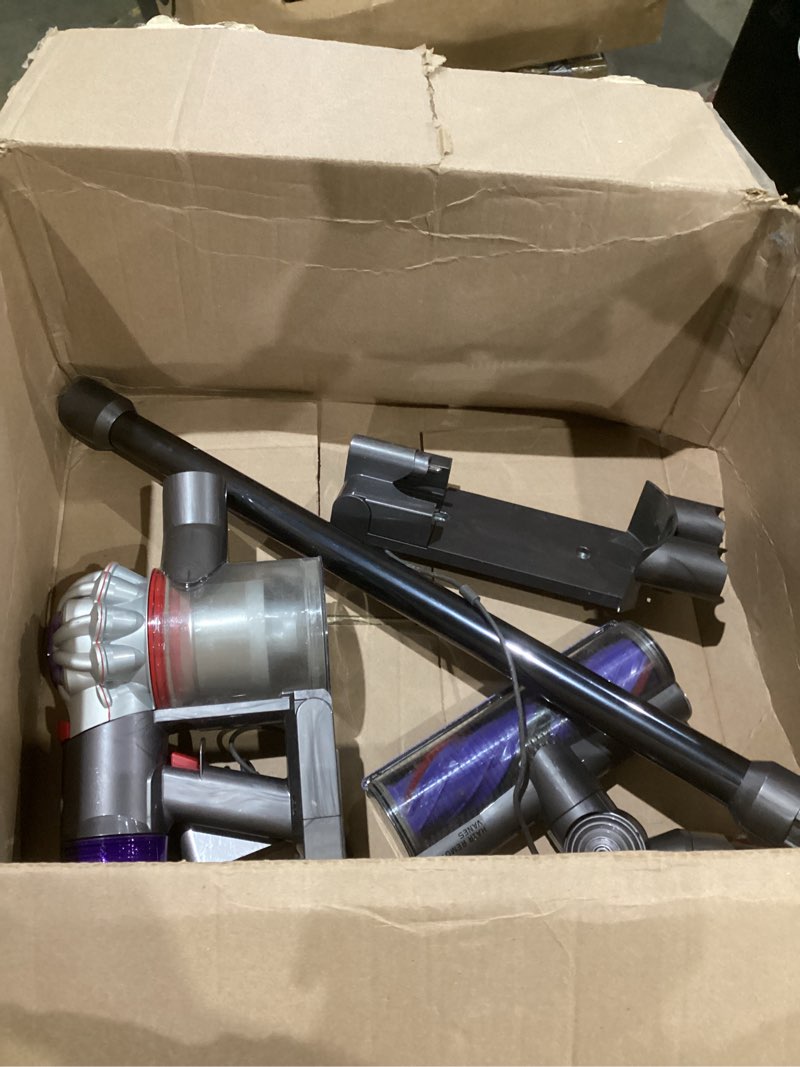 Condition photo showing As Is for dyson v8 plus cordless vacuum, cleans hard floors and carpets, detangles, converts to handheld, 115aw, 2 power modes, up to 40 minutes¹