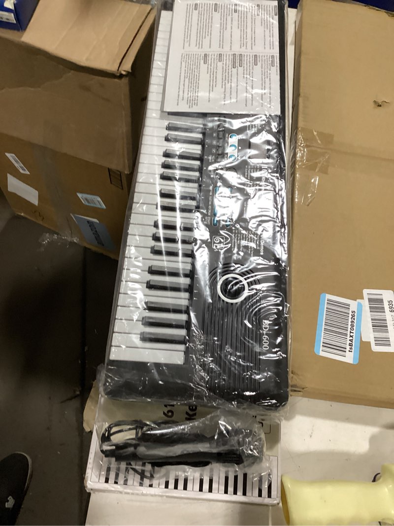 Condition photo showing New/Like New for 61 keys keyboard piano, Electronic Digital Piano with Built-In Speaker Microphone, Portable Keyboard Gift Teaching for Beginners, electric piano for kids Black