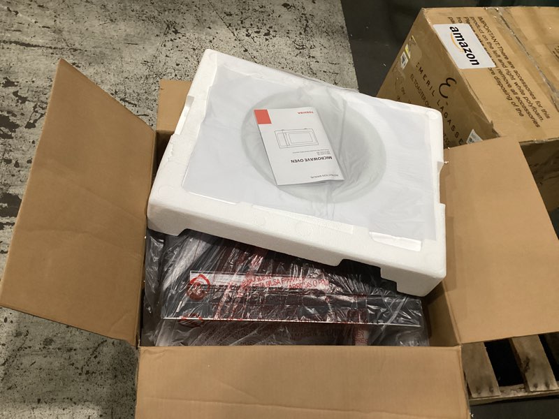Condition photo showing Good Condition for not tested toshiba em131a5c-ss countertop microwave ovens 1.2 cu ft with 12.4\" removable turntable smart humidity sensor, 12 auto menus mute function eco mode easy clean interior, 1000w, silver 1.20 cu.ft