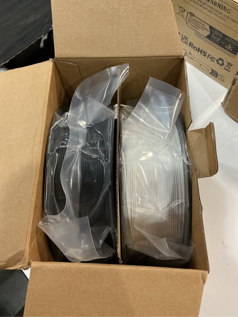 Condition photo showing New/Like New for creality 2kg black & white pla 1.75mm filament bundle for 3d printing with no-tangling strong bonding and overhang performance, accuracy +/- 0.02mm