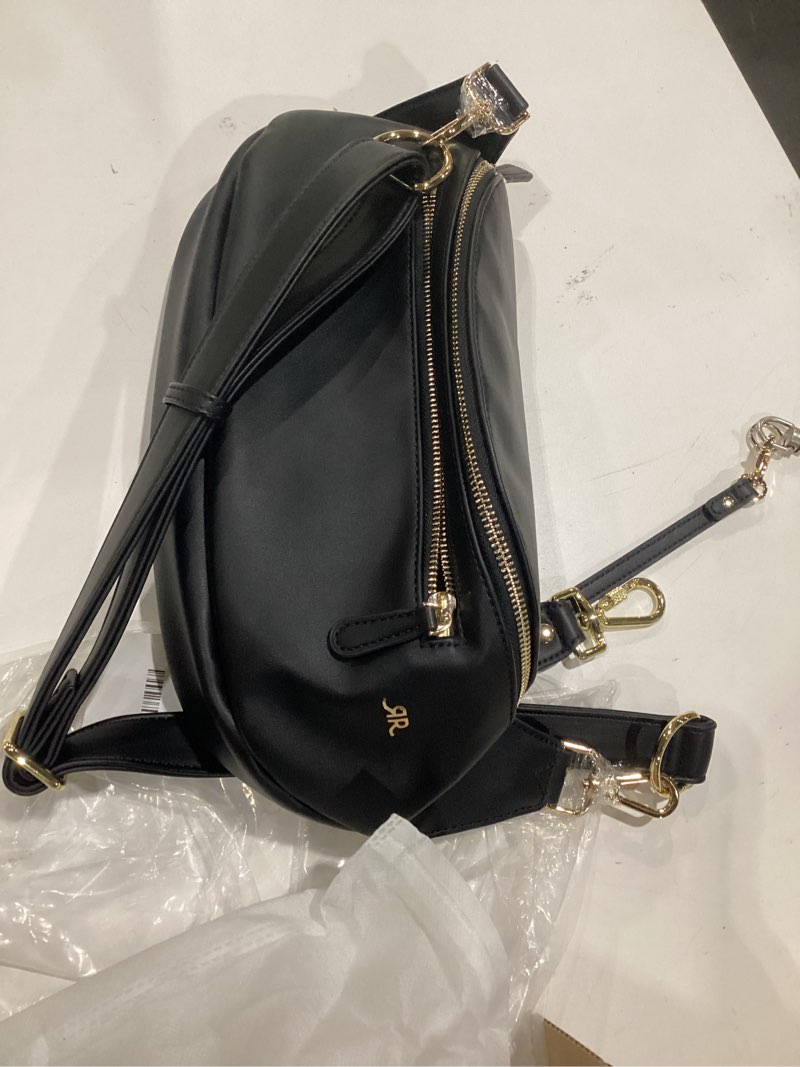Condition photo showing Good Condition for the sidekick camera bag – compact, vegan leather, hands-free crossbody with protective suede interior, black