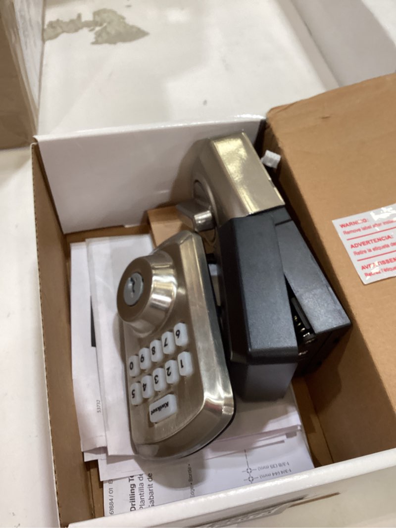 Condition photo showing As Is for kwikset powerbolt 250 10-button keypad satin nickel transitional electronic deadbolt door lock, featuring convenient keyless entry, customizable user codes, and auto-locking