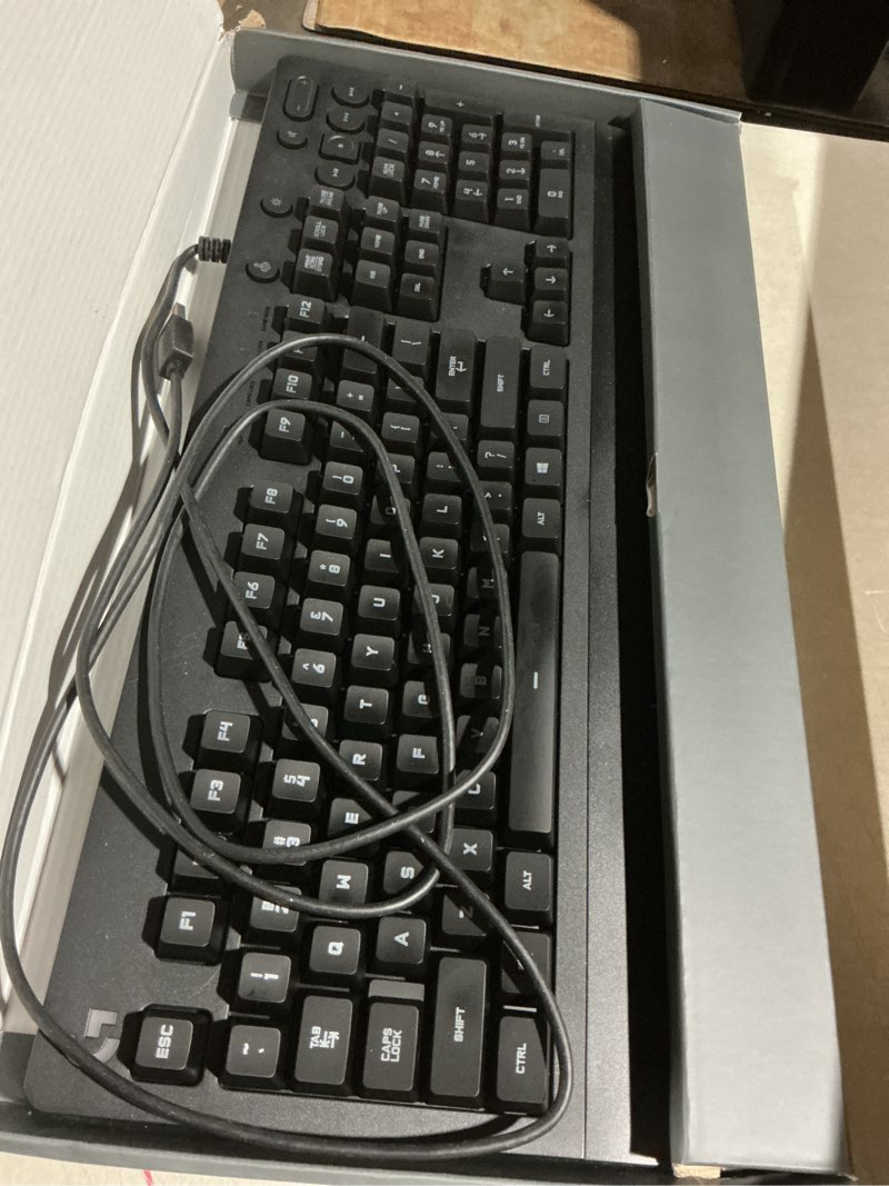 Condition photo showing As Is for Logitech G213 Prodigy Gaming Keyboard - Wired RGB Backlit Keyboard with Mech-Dome Keys, Palm Rest, Adjustable Feet, Media Controls, USB, Compatible with Windows – Black