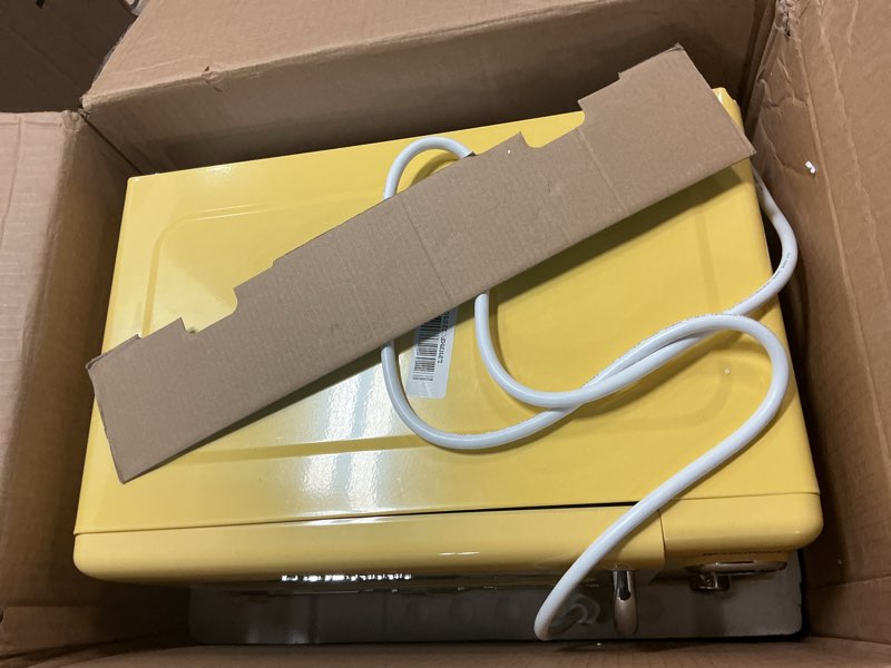 Condition photo showing As Is for Nostalgia NRMO7YW6A Retro Compact Countertop Microwave Oven, 0.7 Cu. Ft. 700-Watts with LED Digital Display, Child Lock, Easy Clean Interior, Yellow Retro Classic 0.7 Cu. Ft. Yellow