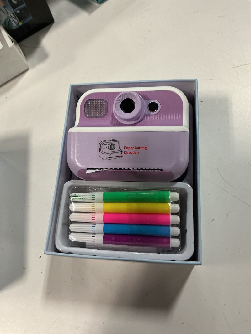 Condition photo showing As Is for Kids Camera Instant Print, Christmas Birthday Gifts Toys for Girls & Boys Ages 3-12, Digital Selfie Portable Camera with 1080P HD Dual Lens, 3 Rolls Print Paper & 32GB Card (Purple)