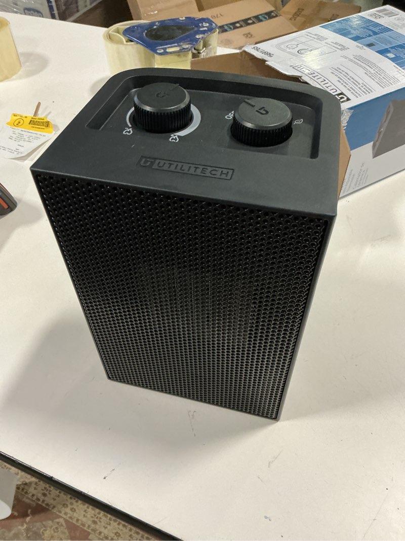 Condition photo showing As Is for Utilitech Up to 100-SQ FT Watt Ceramic Compact Personal Indoor Electric Space Heater
