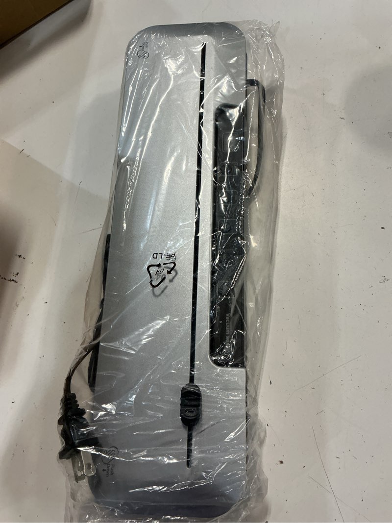 Condition photo showing Good Condition for vacuum sealer machine 75kpa food with 6-in-1 dry/moist modes & digital timer, compact lightweight design, built-in cutter + 10 bags (white) black silver