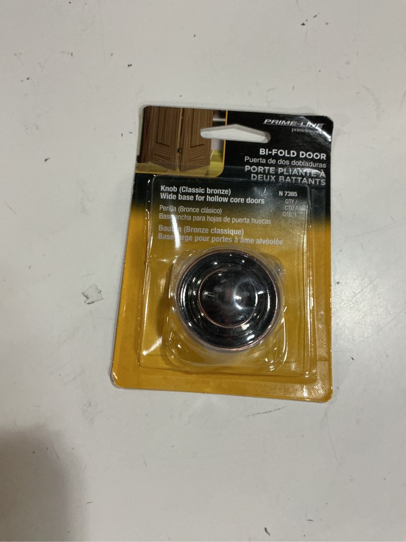 Condition photo showing New/Like New for prime-line n 7385 bi-fold door knob, wide base & large diameter door knob for easy gripping, replace old or unsightly knobs, 1-11/16 in. outside diameter, diecast, classic bronze (single pack)
