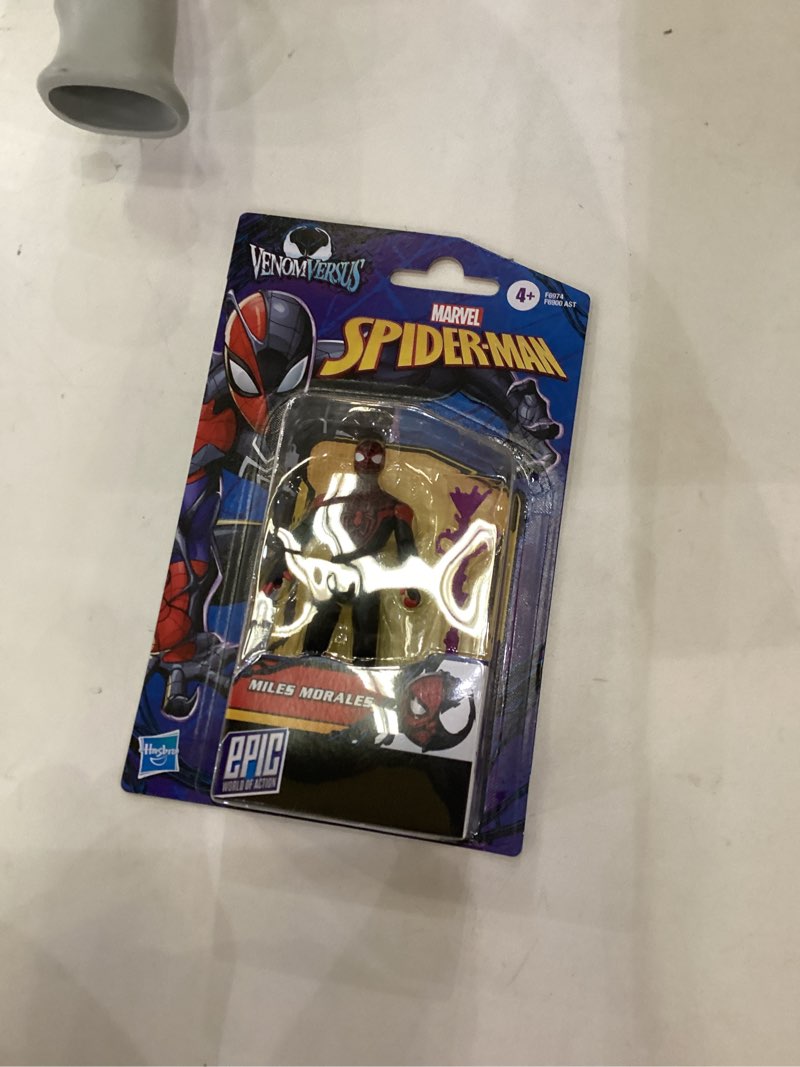 Condition photo showing item condition for venomversus miles morales