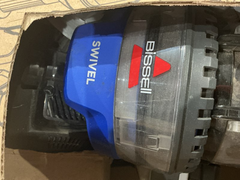 Condition photo showing As Is for bissell cleanview swivel rewind vacuum with automatic cord rewind, turboeraser upholstery tool, triple action brush roll, swivel steering, extension wand, easy-empty dirt tank, multi-cyclonic suction blue
