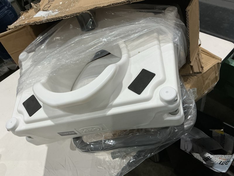 Condition photo showing Good Condition for carex e-z lock raised toilet seat with handles - 4.5 inch toilet seat riser with arms, toilet riser fits most toilets, elongated or round, toilet seat lifter, white
