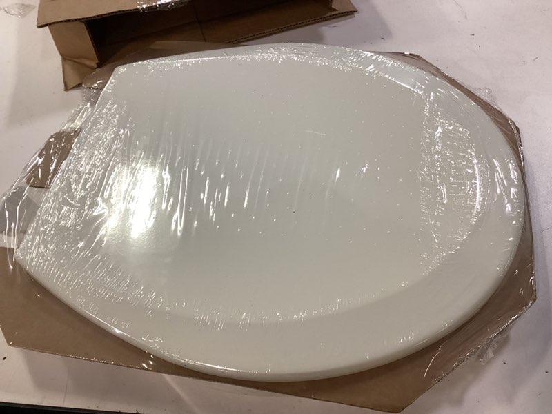 Condition photo showing New/Like New for bemis 500ec durable wood toilet seat with easy clean hinges, made in usa, round, biscuit biscuit round