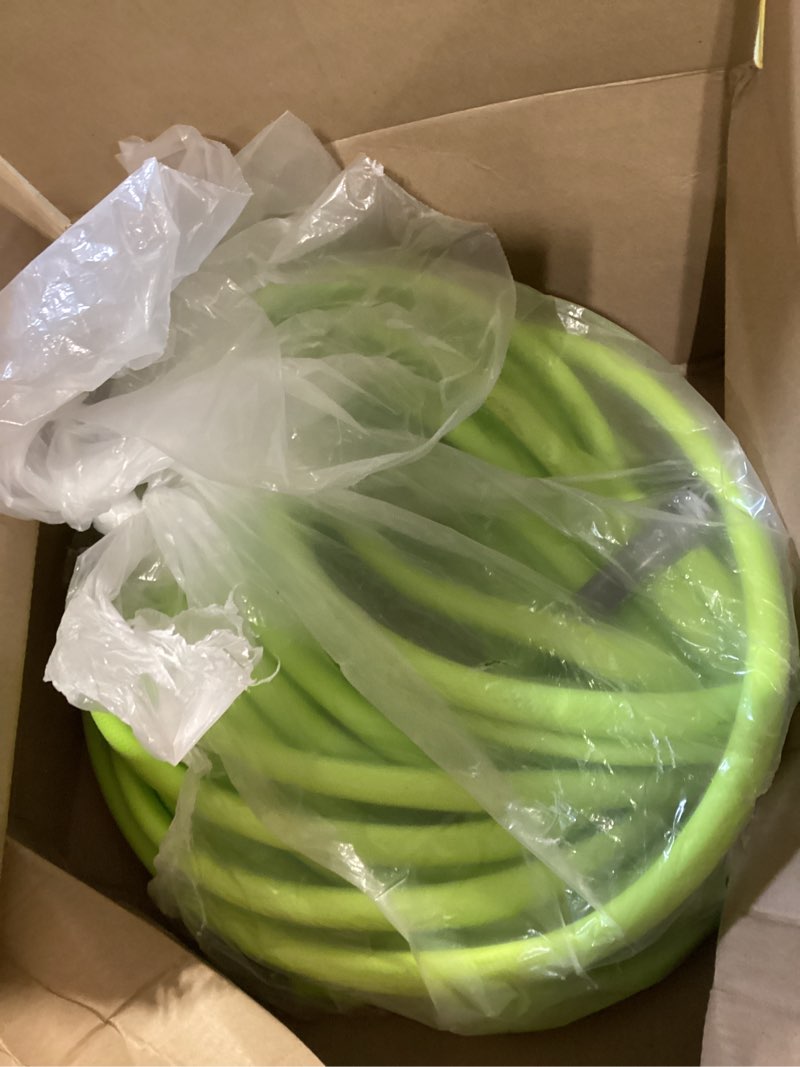 Condition photo showing As Is for flexzilla garden hose 5/8 in. x 100 ft., lightweight all-weather water hose, durable and flexible, leak-free connections standard grip 100ft chartreuse
