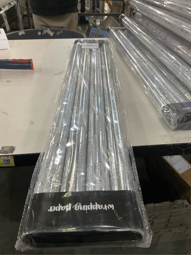 Condition photo showing New/Like New for MAYPLUSS Christmas Wrapping Paper Jumbo Rolls with Gridlines - 30IN X 120IN - 4 Roll - Christmas Tree Snowflakes Candy Cane for New Year Holiday Party Kids Silver Snow X 4