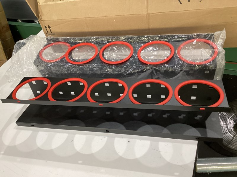 Condition photo showing As Is for **does not include the clips that mount on front of rack, just the red rings**  spray bottle holder rack spray can organizer storage wall mount | metal workshop kitchen warehouse garage organization 5 holes?2 pack?