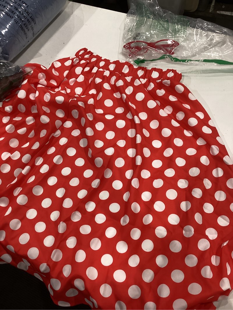 Condition photo showing As Is for kids polka dot swing skirt