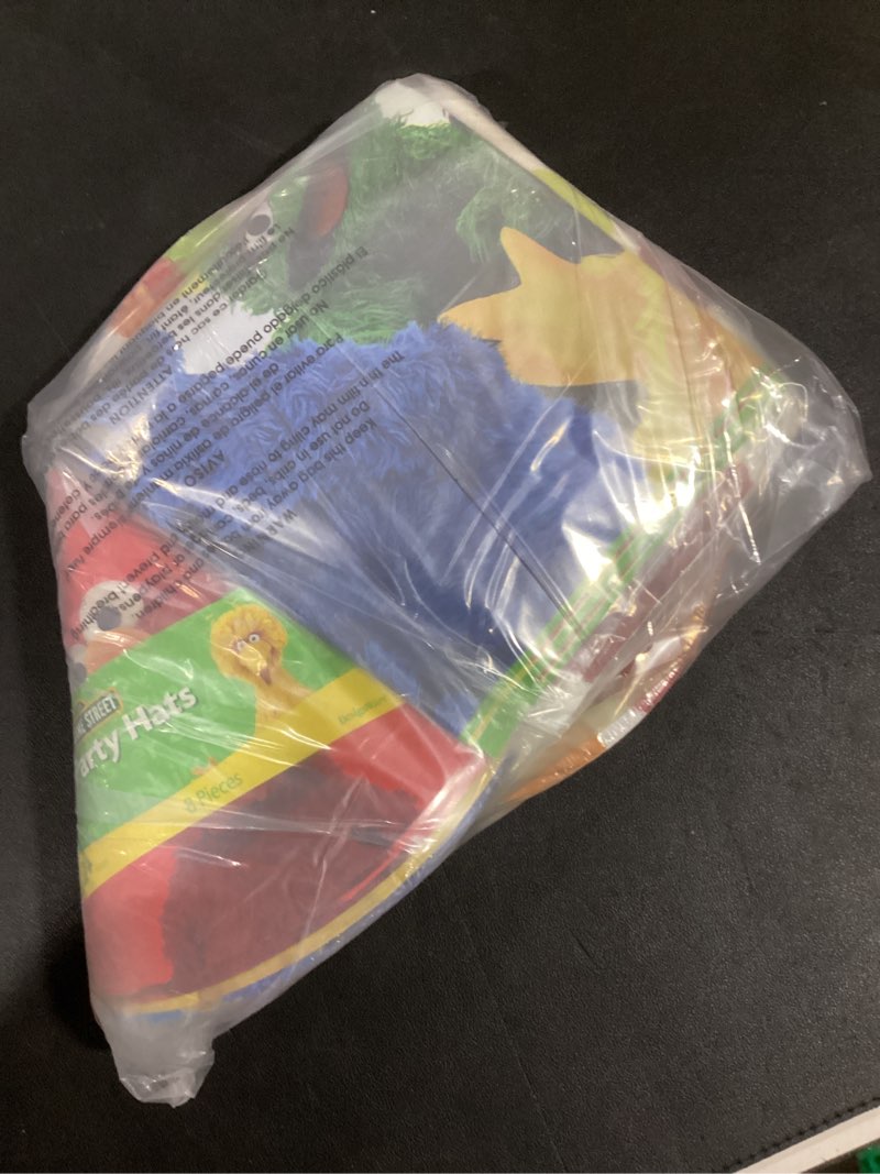 Condition photo showing As Is for Sesame Street Party Decorations Kit for 8 Guests - Bundle with Table Cover, Plates, Napkins, Hat Featuring Elmo, Big Bird, and Cookie Monster for Birthday | Sesame Street Party Supplies Set