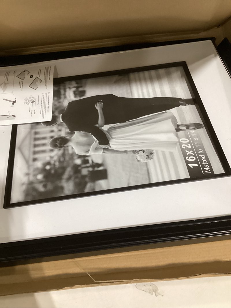 Condition photo showing New/Like New for Yaetm 16x20 Black Picture Frame with Decorative Inner Frame & Tempered Glass, Display 11x14 Photos with Mat on Wall - Portrait or Landscape - Ideal for Office & Home Décor (Black, Single) 16x20 - 1 pack Black