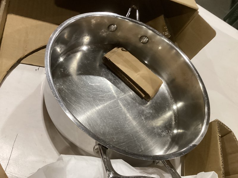 Condition photo showing As Is for used incomplete cuisinart pureclad™ triple ply stainless steel 5.5 qt. saute pan w/cover 5.5 quart saute pan