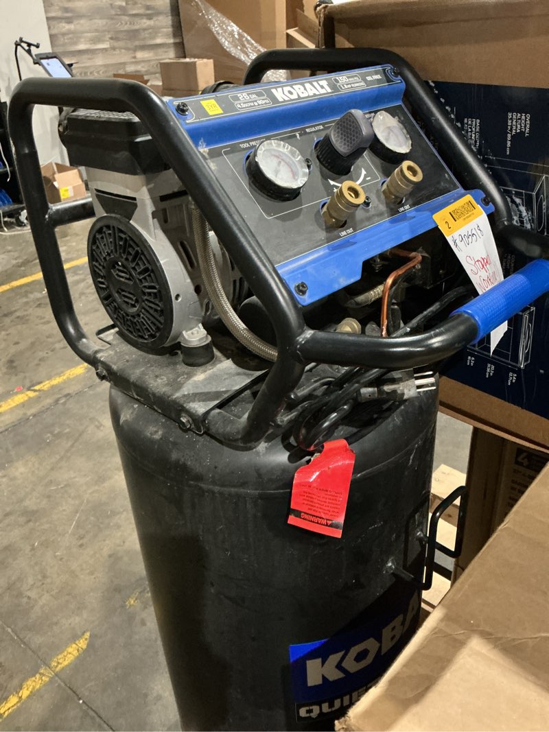 Condition photo showing As Is for oil free air compressor