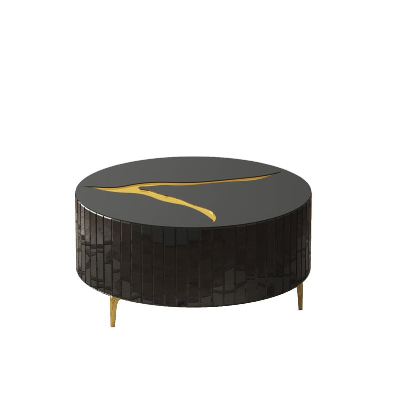 timeless black modern round coffee table with gold accent design
