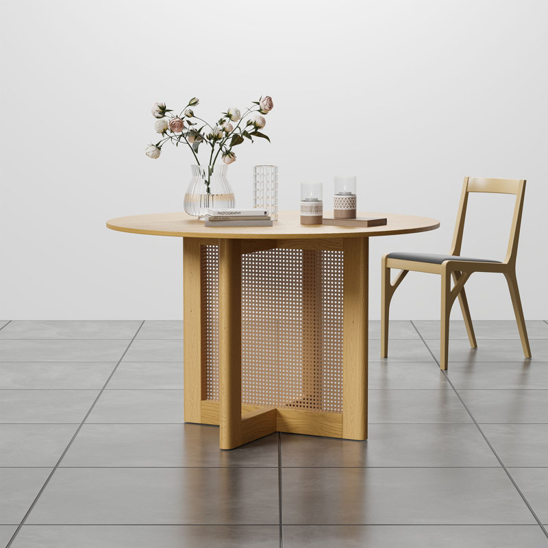 round solid wood dining table with rattan pedestal
incomplete 
similar 