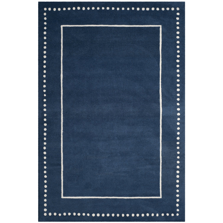 cruz bella hand tufted wool solid color rug