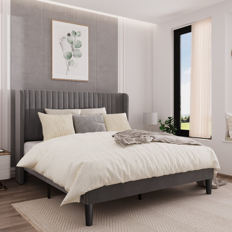 candler velvet upholstered platform bed with wingback headboard and wooden slats