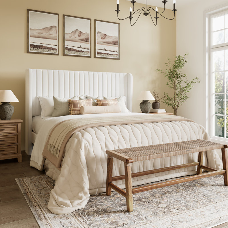 candler velvet upholstered platform bed with wingback headboard and wooden slats