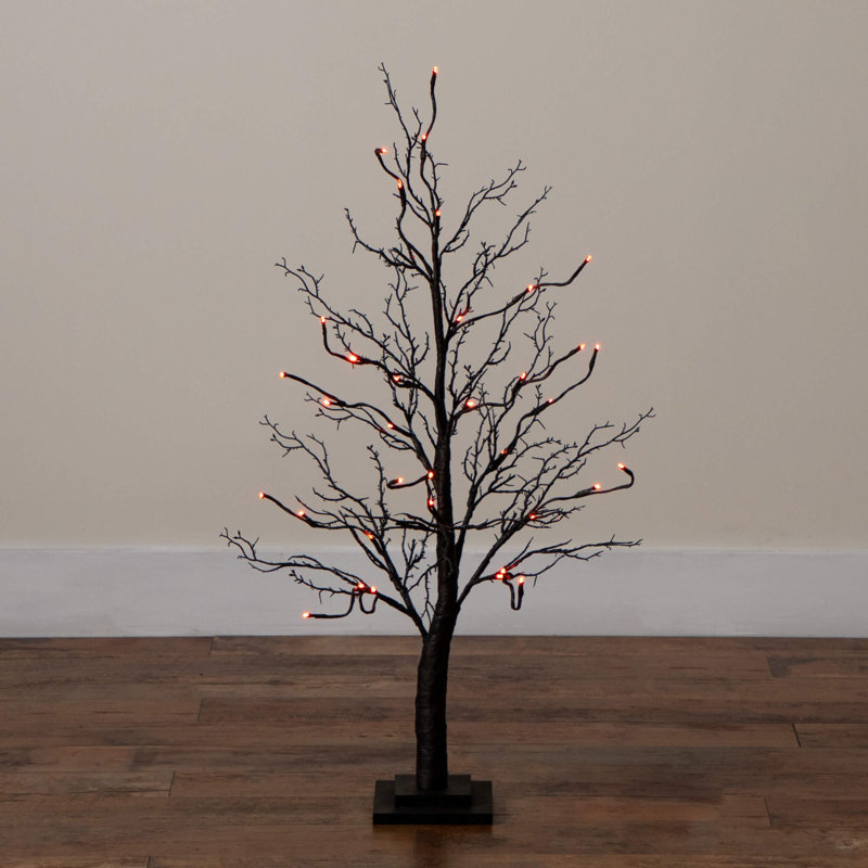 pre-lit halloween deluxe black twig artificial tree with 180 orange & purple led lights
